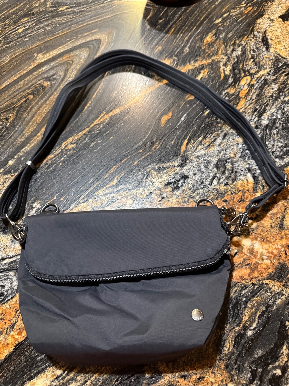 Pacsafe Black Compact Crossbody with Zipper Flap